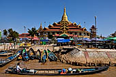 Inle Lake Myanmar. Phaung Daw Oo Paya. Enshrined in the pagoda are five small ancient Buddha images that have been transformed into amorphous blobs by the sheer volume of gold leaf applied by devotees.  